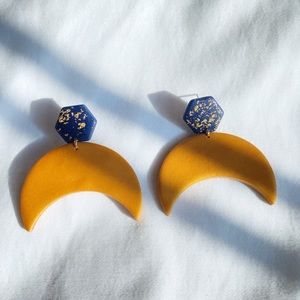 Gold and navy crescent earrings